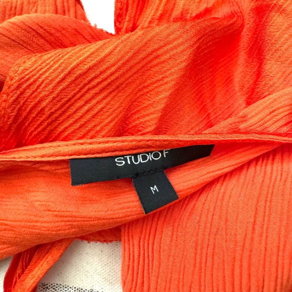 Studio F Orange Deep V-Neck Top with Cross Lines Detai in Back. - Picture 8 of 8